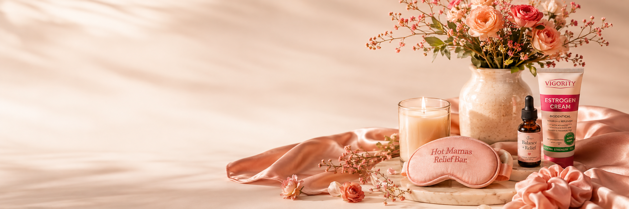 Hot Mamas Relief Bar curated wellness products with flowers, candle, and self-care items
